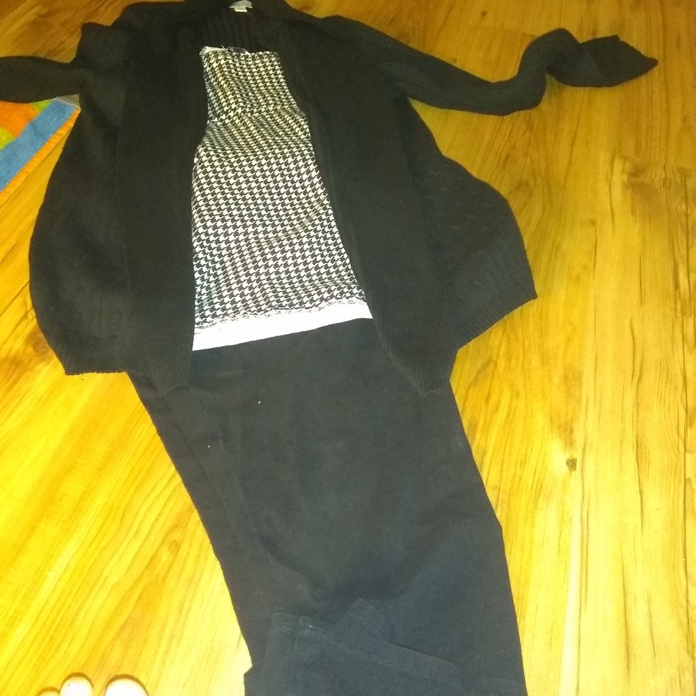 Hounds tooth with black sweater and blacl ny tight